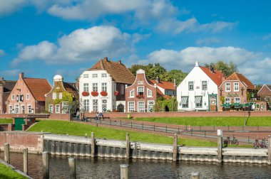 Historic houses in Greetsiel, Germany clipart