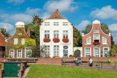 Historic houses in Greetsiel, Germany clipart