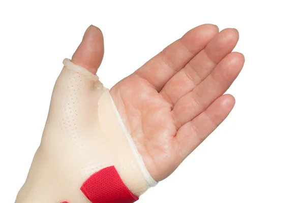 Hand with wrist and thumb splint — Stock Photo, Image