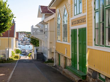 Marstrand, Sweden - Aug 16, 2025: Streetscene with Missionshus, mission house, in Ostergatan in old town, Bohuslan, west coast Sweden