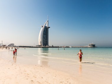 Jumeirah Beach and Burj al Arab in Dubai clipart
