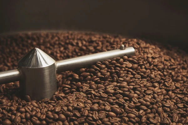 Beans freshly baked  hot inside roasting machine closeup — Stock Photo, Image