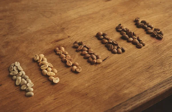 Different grades of coffee roasting — Stock Photo, Image