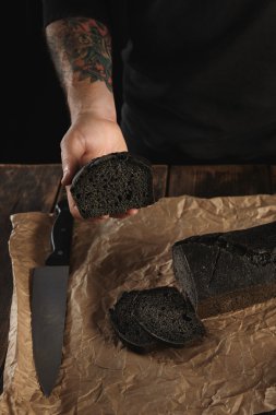 baker offers homemade luxury bread clipart