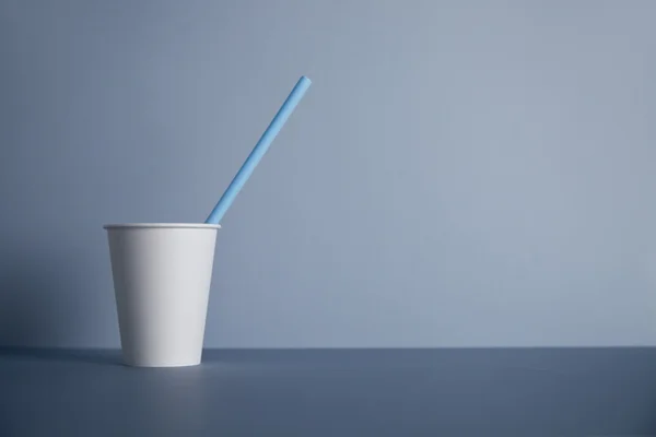 White paper cups isolated on gray — Stock Fotó