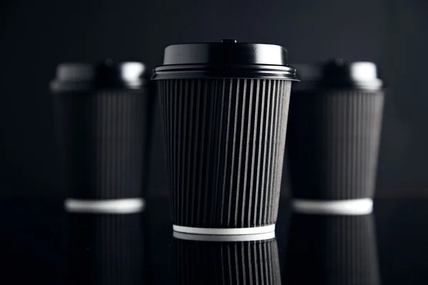 Set of black take away cardboard paper cups — Stock Photo, Image