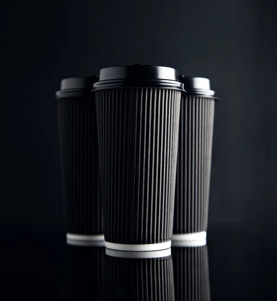 Black luxury take away paper cups set mirrored — Stock Photo, Image