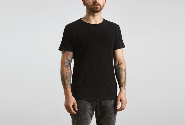 man poses in black blank t-shirt
