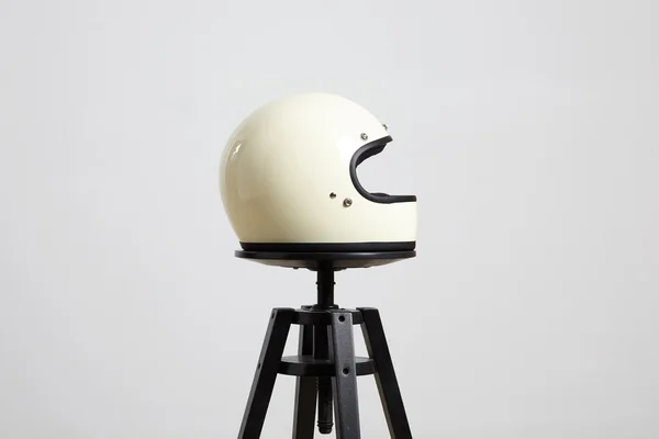 Motorbike helmet on chair right side — Stock Photo, Image