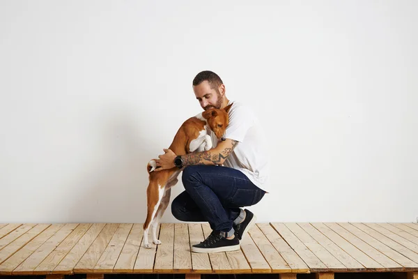 Owner and dog having hugs — Stock Photo, Image