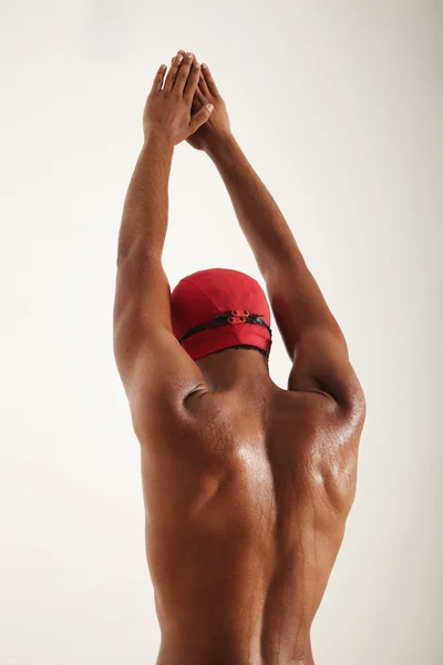 Nuotatore nero alzando le mani per immergersi — Foto Stock