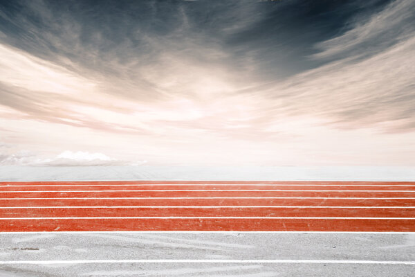 Low angle side shot of a running track, orange
