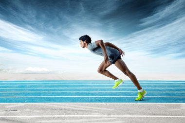 Sprinter yolda öne doğru eğilerek