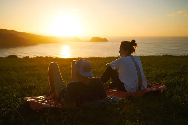 Tourists enjoying view at sunset — Stock Photo, Image