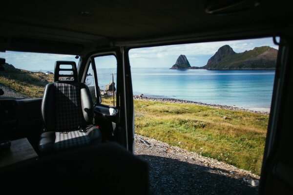 View from inside of camper van on beach Stock Photo