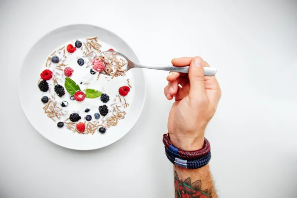 Muesli with milk and berries for breakfast — Stock Photo, Image