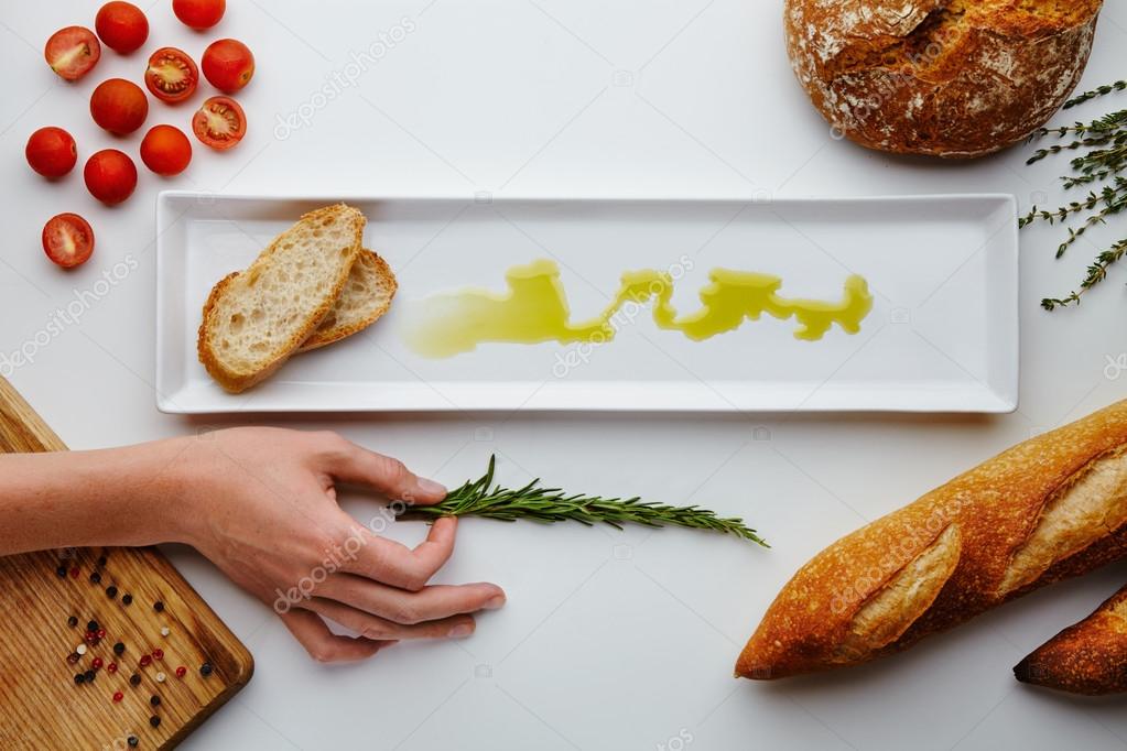 composition with bread, olive oil, tomatoes cherry, pepper