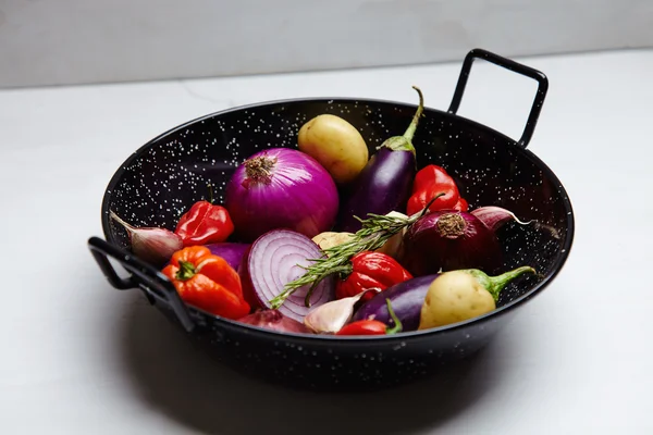 Mixed spicies and vegetables in wok plate side view — Stock Photo, Image