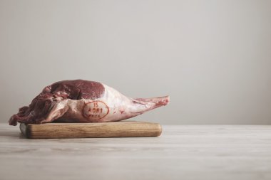 Stamped icelandic lamb leg meat isolated on table