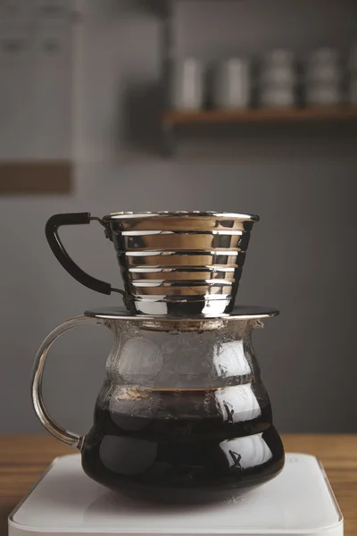 Side of transparent chrome drip coffee maker — Stock Photo, Image