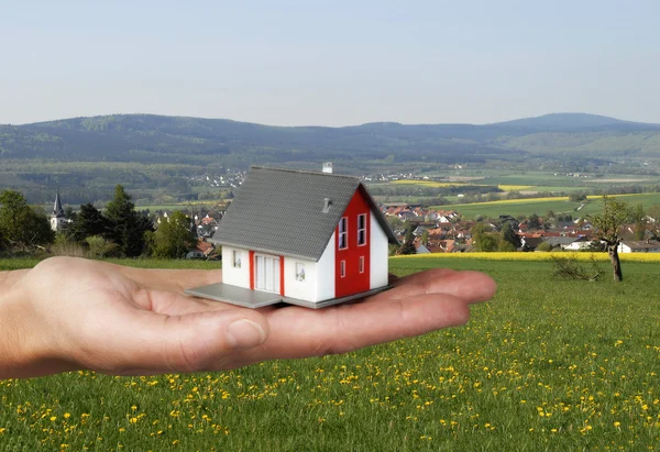House on a hand — Stock Photo, Image
