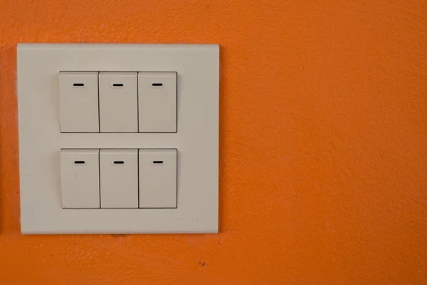 Dimmer anahtarı ve ışık switchboard.over duvara geçiş — Stok fotoğraf