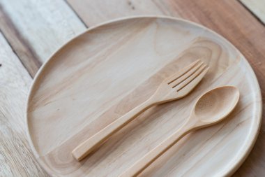 ahşap yemek ve ahşap table.with metin alanı üzerinde ahşap çatalı