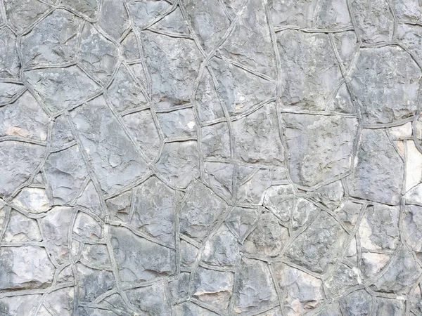 Fond mur texturé gris avec pierre brute maçonnerie à motifs — Photo