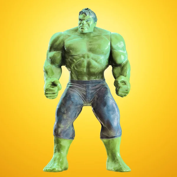 Een groene speelgoedhulk staat met vuisten tegen een gele achtergrond met achtergrondverlichting. Vooraanzicht. 3d destructie — Stockfoto