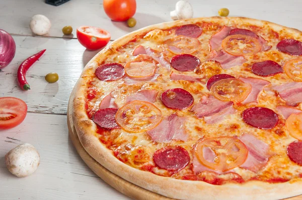 Meat Pizza with Salami, Bacon and Tomato Slices