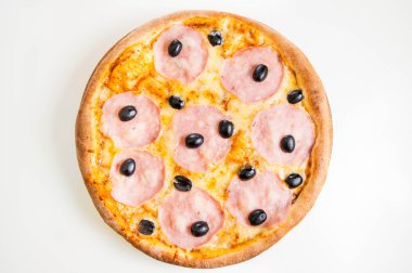 Close up Hot  meat pizza with ham  and olives