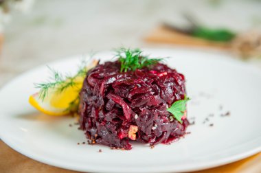 Close up portion of  Vegetarian salad with sliced beet
