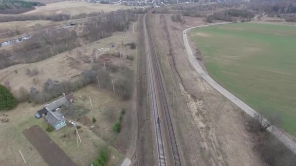 Flying over the railway.surrounding countryside — Stock Video