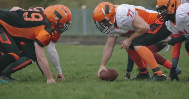 American football, football team in the game, training aggressive opposition during the game, 4k slow motion.