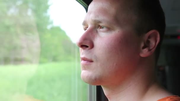 Man Travelling by Train Looking Window — Stock Video