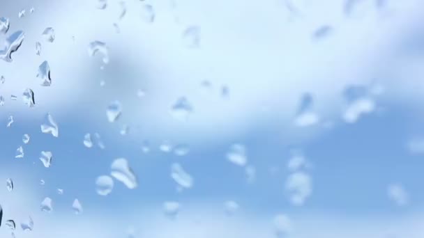 Gotas de agua en la ventana de cristal — Vídeos de Stock