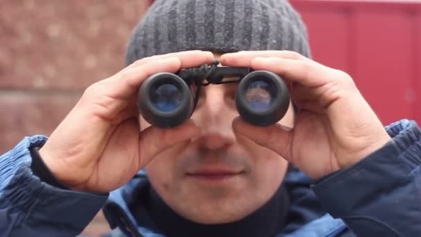 Man with Binoculars Looking Toward — Stock Video