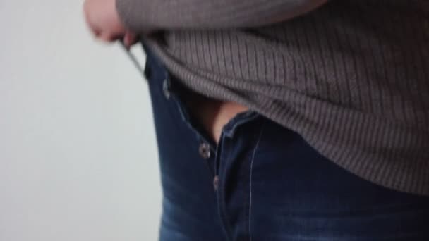 Overweight Woman Putting on Jeans — Stock Video