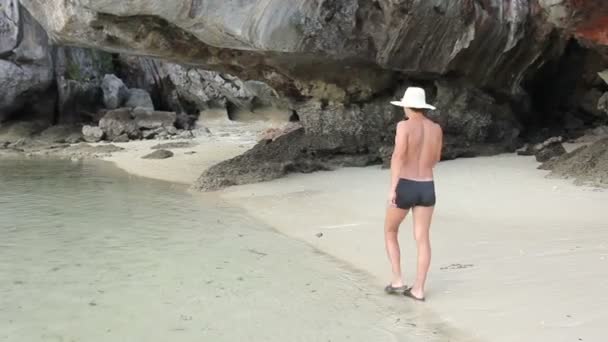 Man Walking along the Beach — Stock Video