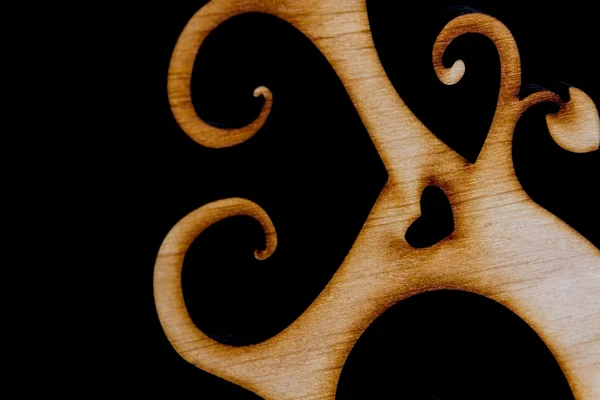 Abstract decorative wooden tree on black background — Stock Photo, Image