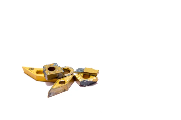 Разбитые золотые токарные инструменты — стоковое фото