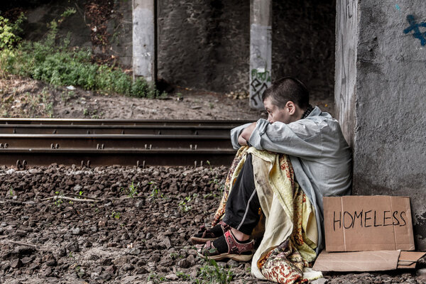 Desperate homeless woman