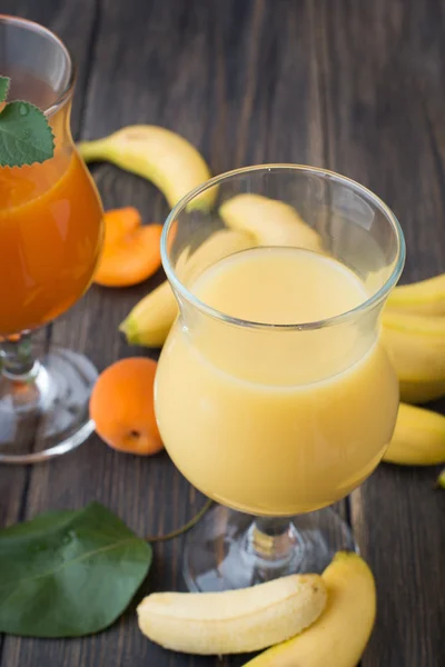 Fresh apricot and banana juice — Stock Photo, Image