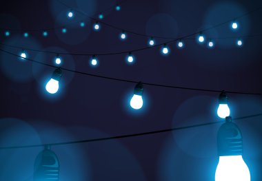 Mavi Noel partisi ışıklar arka plan. Parlayan ışıklar