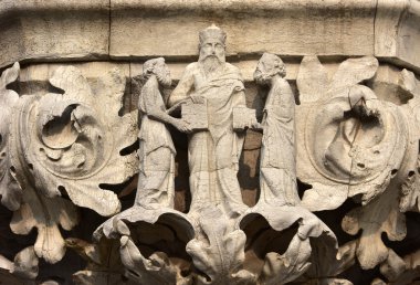 Aristotels and disciples on Doge's Palace beautiful capital, in Venice