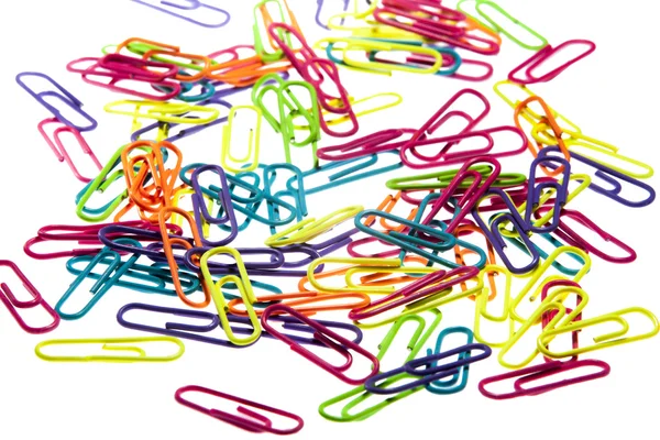 Colorful paperclips isolated on a white background Royalty Free Stock Photos