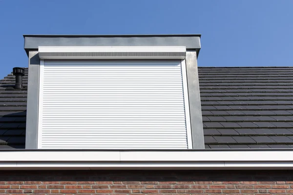 Dormer window with rolling safety  shutter — Stock Photo, Image