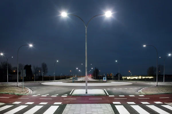 Rotonda iluminada por luces led en el crepúsculo —  Fotos de Stock