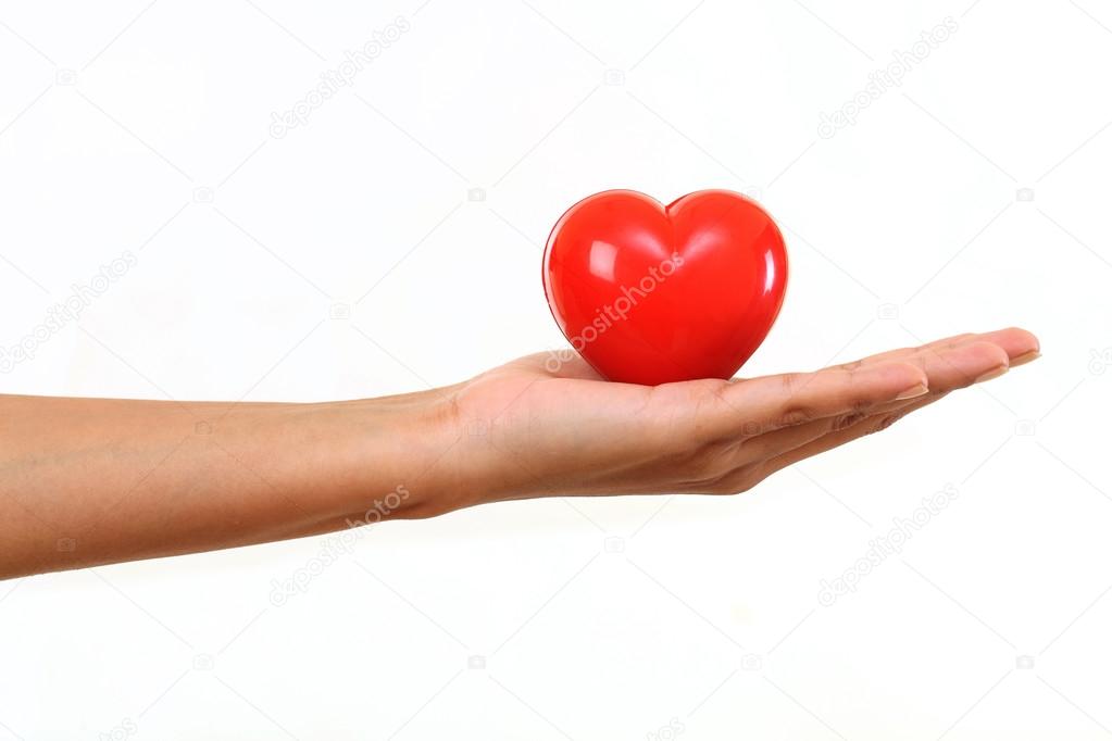 Hand holding Red heart shape