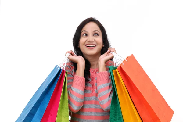 Emocionado joven feliz sonriente mujer con bolsas de compras —  Fotos de Stock